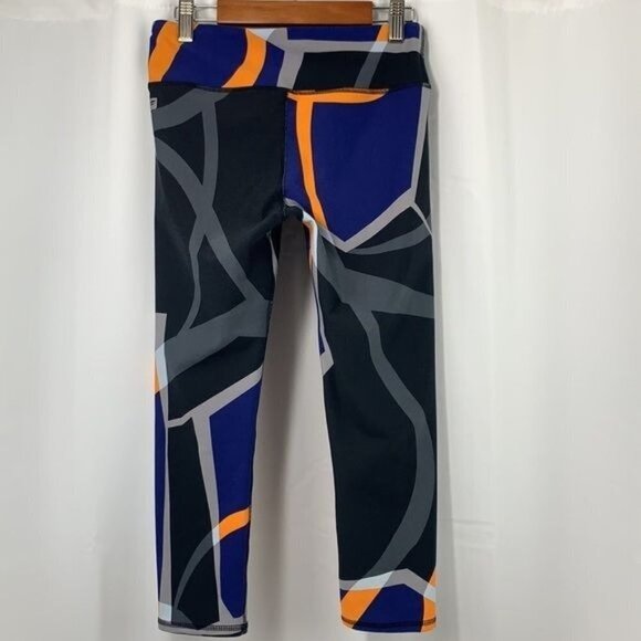 Fabletics Capri Length Workout Tights Style#PT1510236 - Blue/Gold/Black, Size XS - Picture 2 of 7